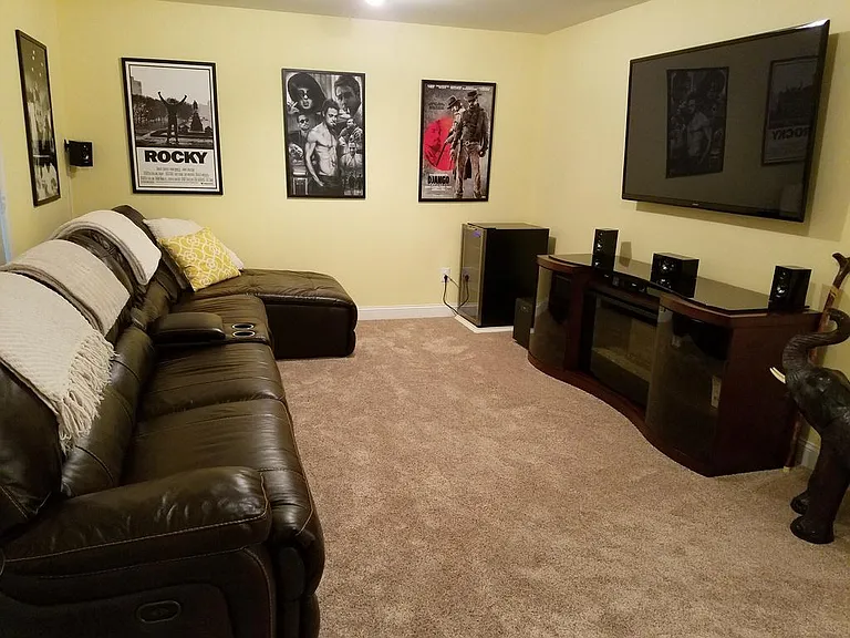 Family/Theatre Room. Old setup. Current tenant uses as a Lego toy room. Can also be used as a 4th Bedroom
