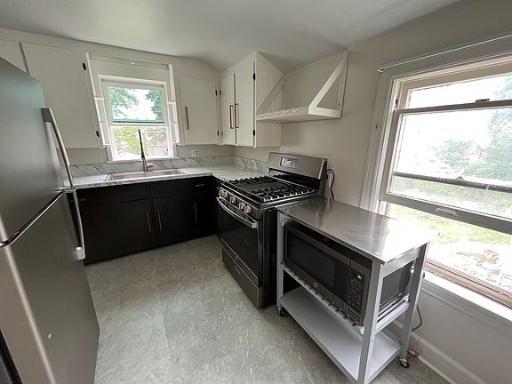 Kitchen remodeled in 2023 with new appliances, flooring and countertops.