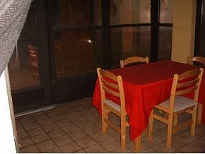 tiled spacious back porch