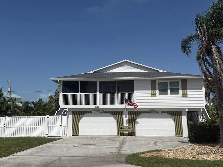 8302 Marina Dr — Photo 1