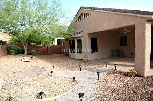 Back View of Patio, landscaping,irrigation system, and BBQ Area