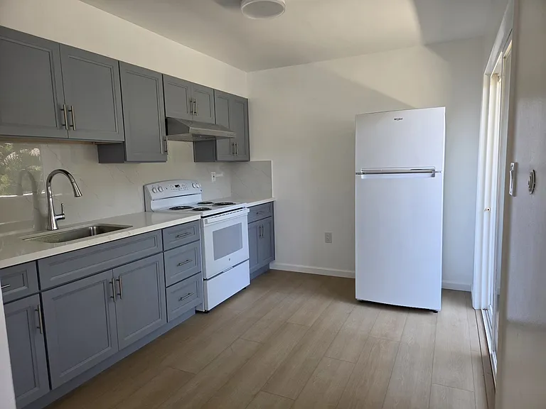 Completely new kitchen with new cabinets, sink, appliances