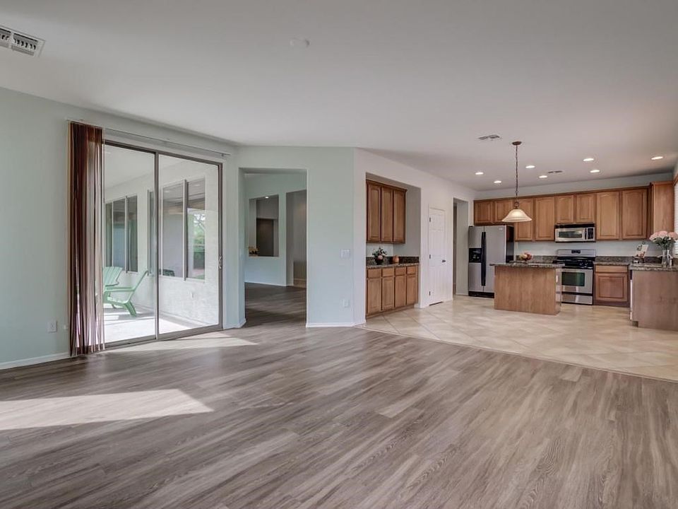 Open Kitchen w exit to Patio