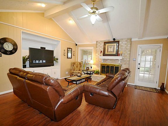 Den w/Vaulted Ceiling, Fan, Built-in and Fireplace