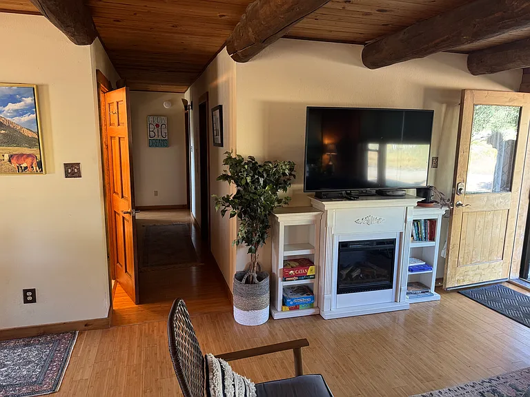 Living room and view down main hallway