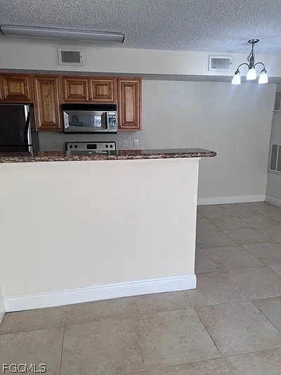 12571 Equestrian Cir #903 — Photo 5