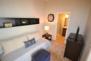 Sofa is either a TwinXL as is, just move the pillows. Makes into a QUEEN by shifting the bottom out