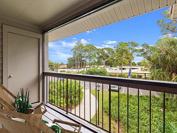Screened Balcony with Extra Storage