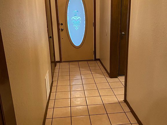 Front door, entry into living room