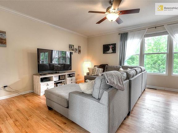 Open floor plan with wood floors