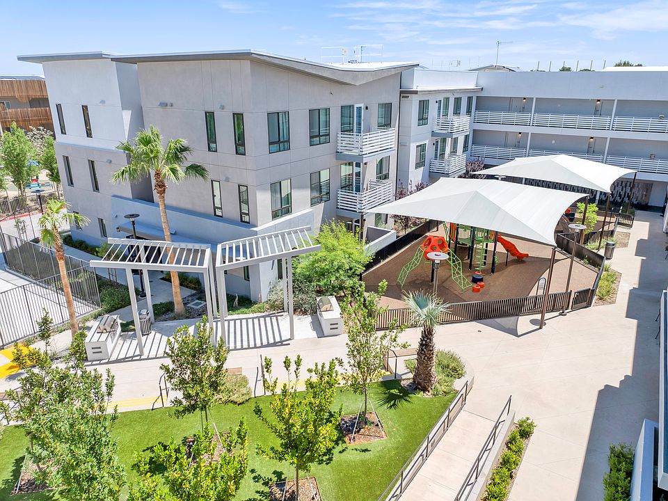 Shaded play area at the heart of the community, offering a safe and inviting space for everyone.
