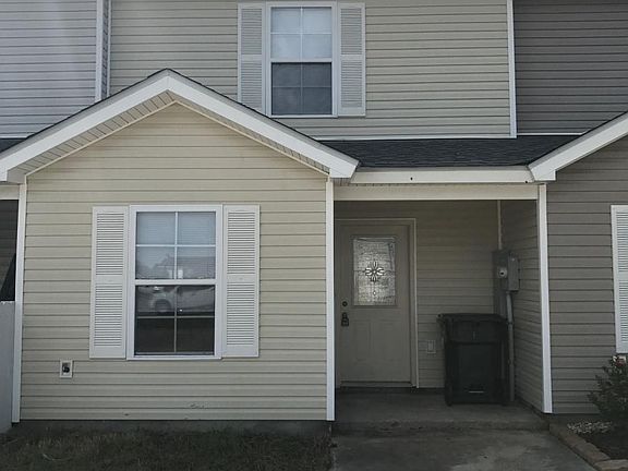 Front of property with two parking spots.
