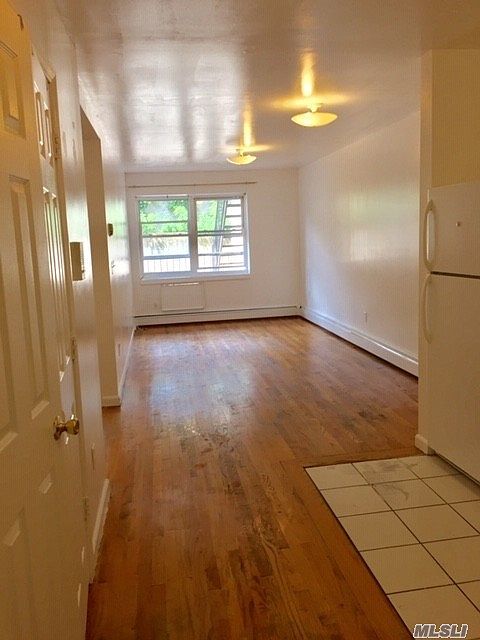 1st image of 31-10 60th St Floor 1