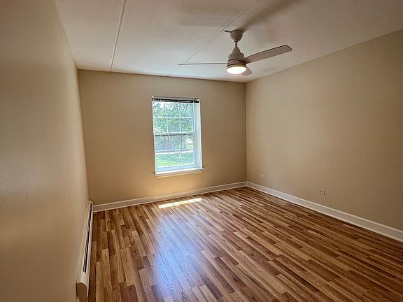 Large bedroom over looks lovely mature trees