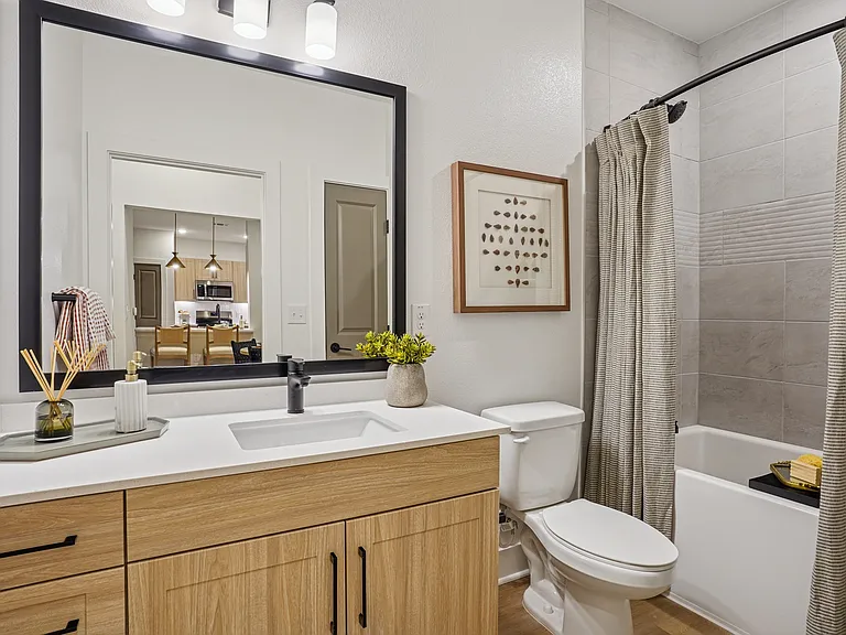 Bathroom with Quartz Countertop and Soaking Tub