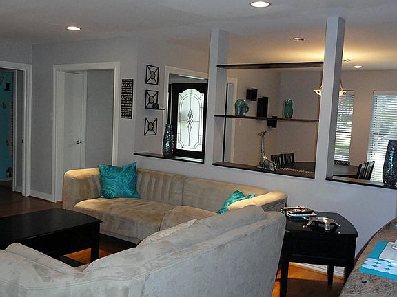 View of formal dining and entry from family room