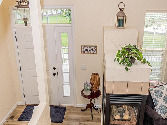 Entrance into first level. Entire house has new LVT easy care flooring. No carpet throughout.