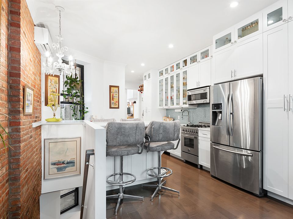 1st image of 323 E 8th St APT 1B