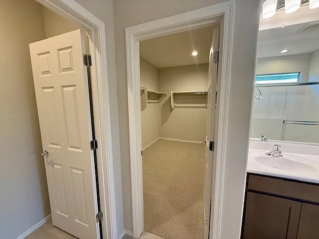 Primary walk-in closet