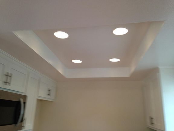 High Ceiling with canned lights in kitchen