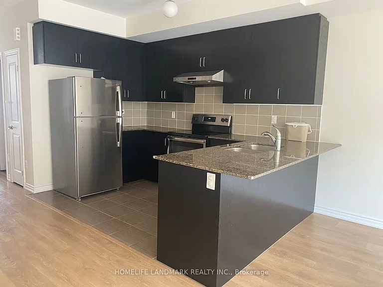 157 Rustle Woods Ave — Photo 4