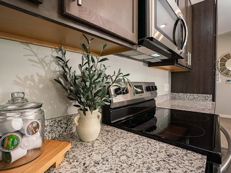 Closer look at the oven and microwave at Heartland Flats Alliance.
