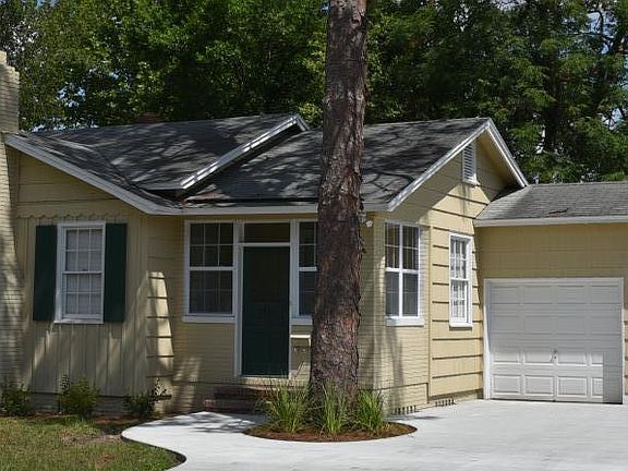 Paved sidewalk + 3 car driveway + 2 car garage + new roof