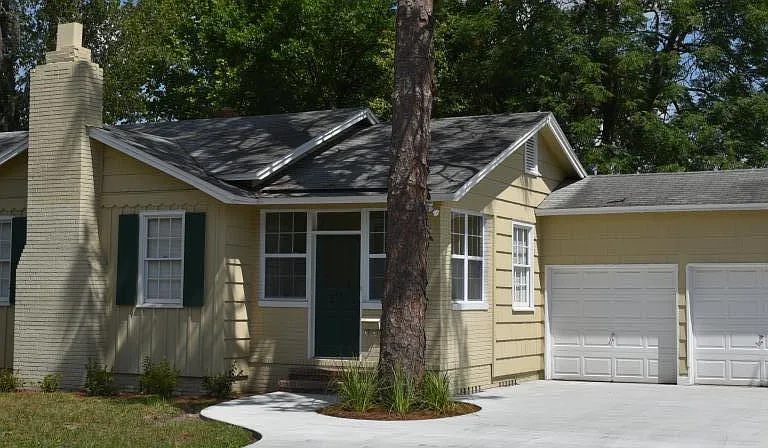 Paved sidewalk + 3 car driveway + 2 car garage + new roof