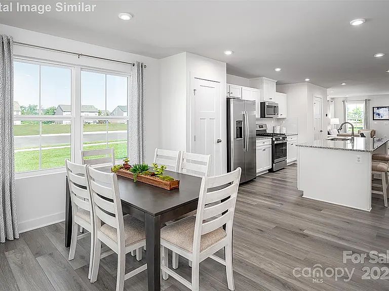Photos are of the model home: The same floor plan and similar finishes as 107 Jameson Park Dr. #5