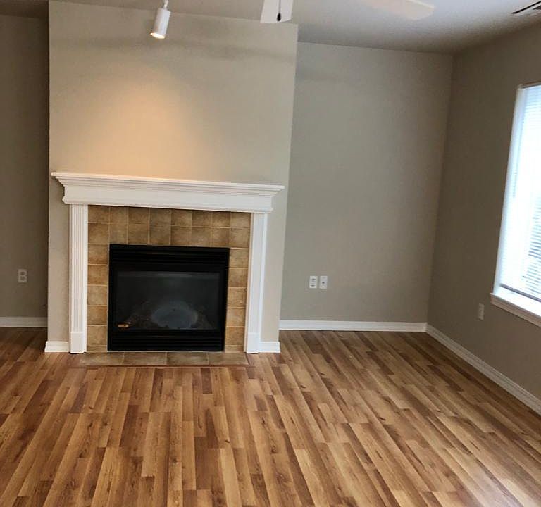 Living area. Gas fire place. Comes handy when power is out during cold months.