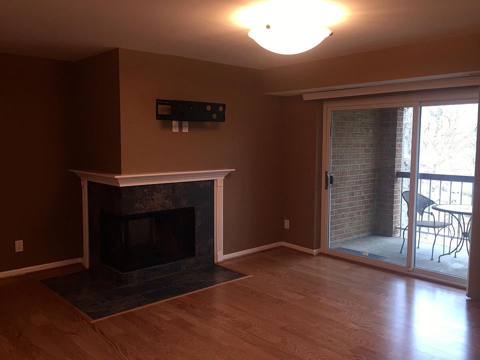 Living Room with wood burning fireplace.