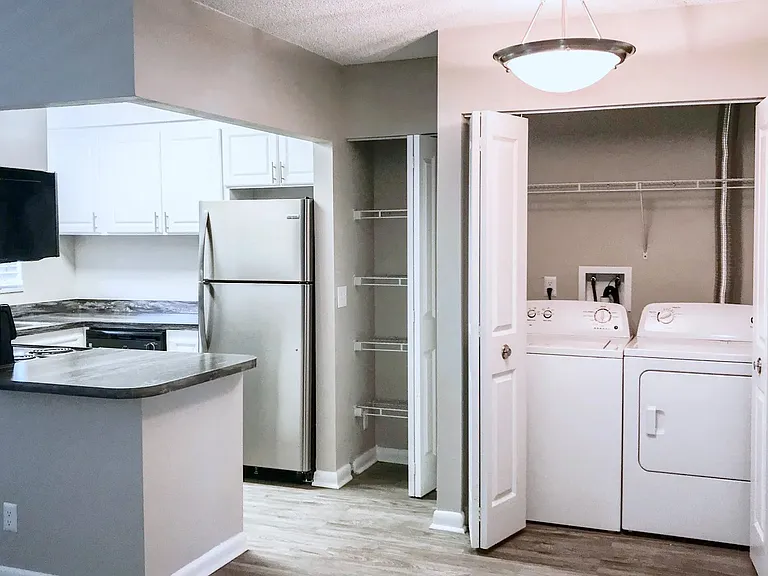 We also offer renovated kitchens, featuring black fusion granite-like countertops, wood-style flooring, stainless steel appliances, and spacious white cabinetry to meet all your culinary needs.