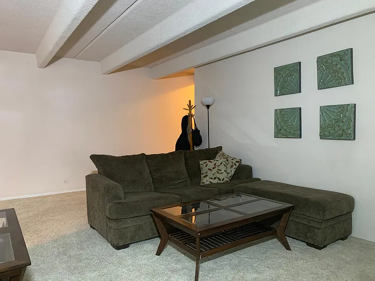 The other side of the living room looking towards the entryway.