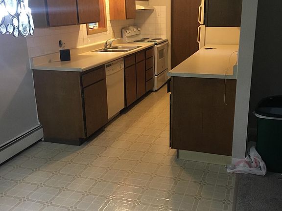 Galley kitchen with pantry