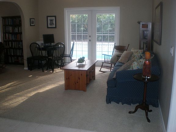 The view of the living room from the front door. All carpet was updated in '05