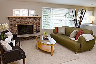 Living room with woodburning fireplace