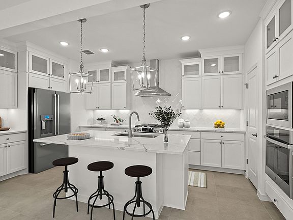 Kitchen with upper glass cabinets