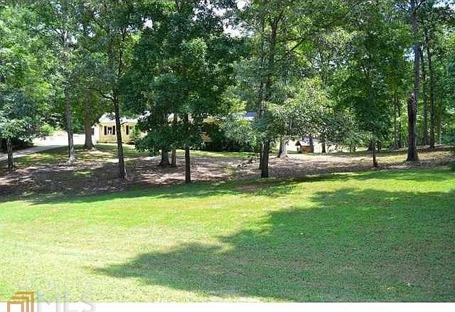 Delightful 3 bedroom, 2 bath ranch offers tons of character tucked in the ultimate in tranquility!