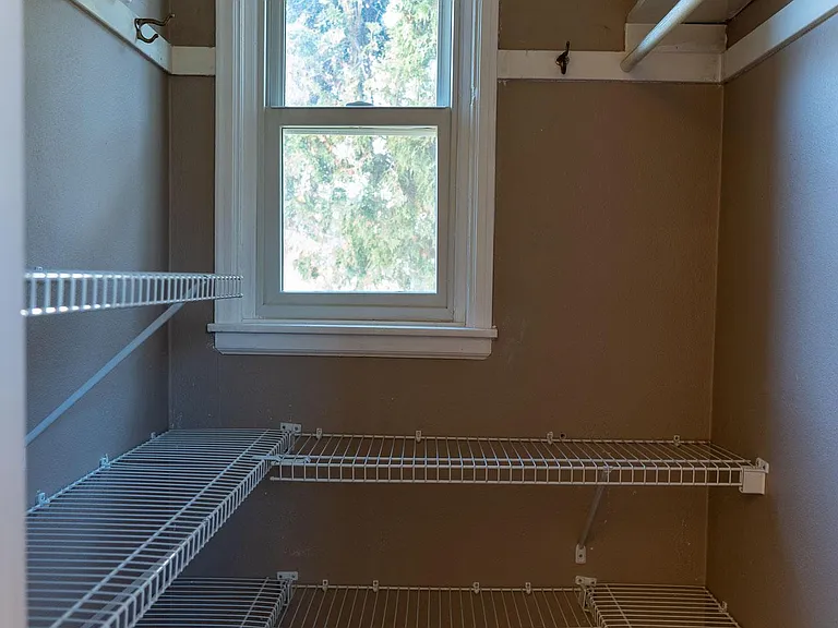 Walk-in closet in master bedroom