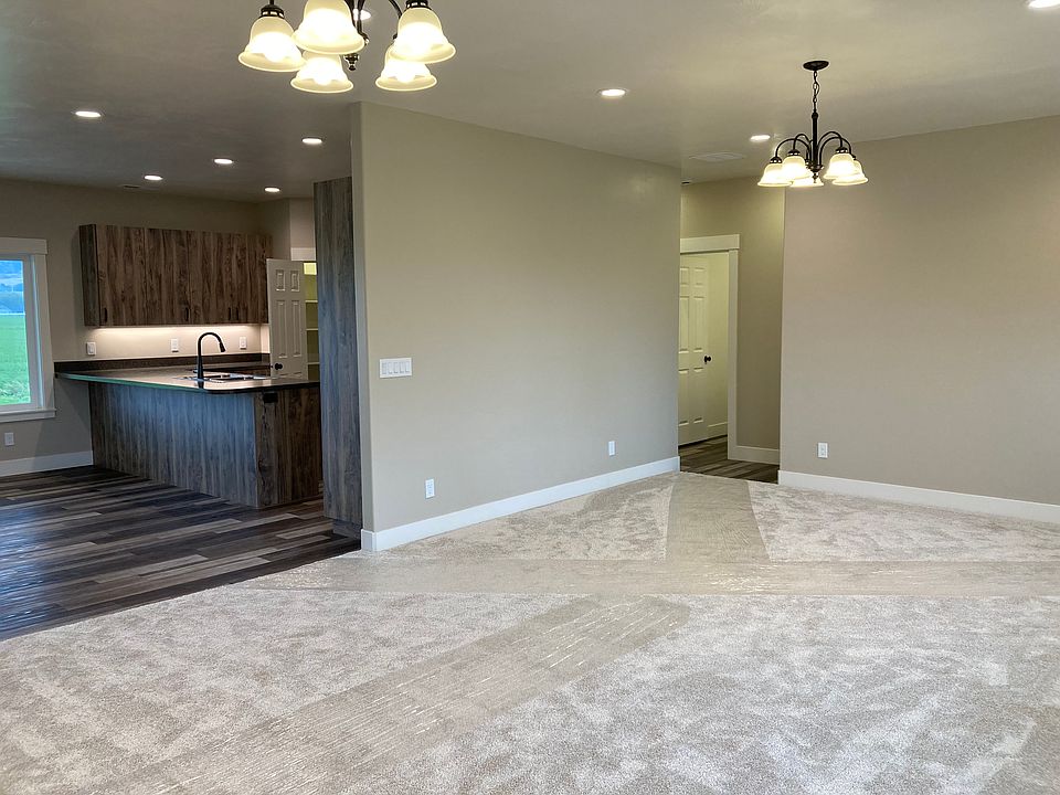 front room looking into kitchen/dinning