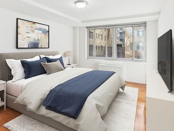 Bedroom with hard surface flooring