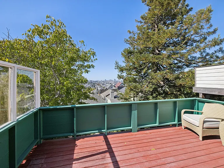 Large top level deck. A smaller deck sits one level below and to the right.
