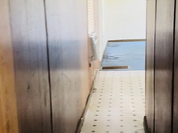 Walkway from bedroom to kitchen and living room