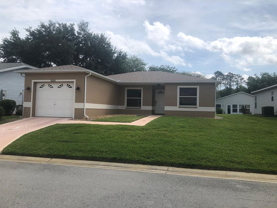 Large front and back yards auto sprinkler system, new roof and paint, single garage with door opener