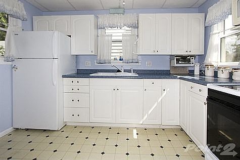 Lots of cabinets and counters