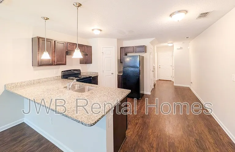 8419 McGirts Village Ln — Photo 2