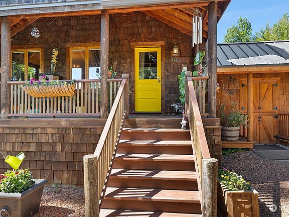 408 S 2nd street- a grand staircase leading up to a welcoming and vibrant front door that opens up to a world of original craftmanship.>