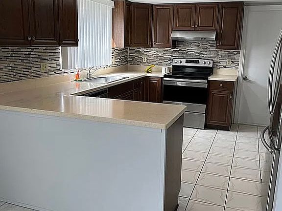 4th image of 9840 Woodstock Ln