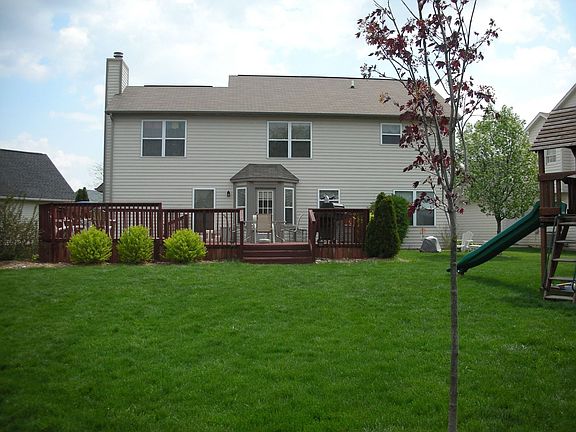 Large back yard gives ample room for pets or kids or maybe a garden.