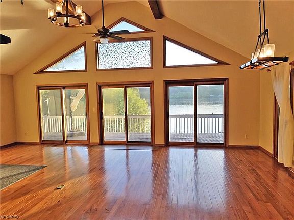 Great room looking towards deck and river